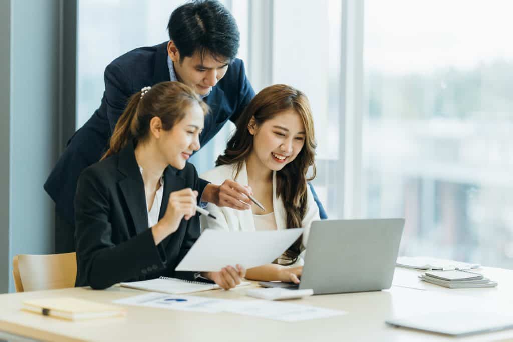 HR and finance team working through a Singapore payroll year-end checklist together.